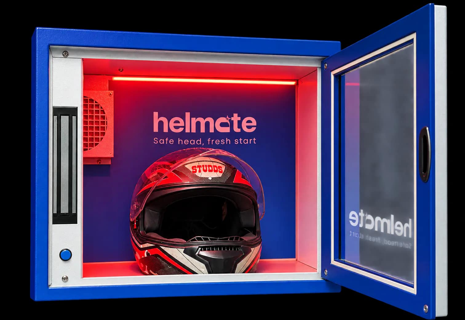 The Helmate chamber open with a helmet inside under UV light