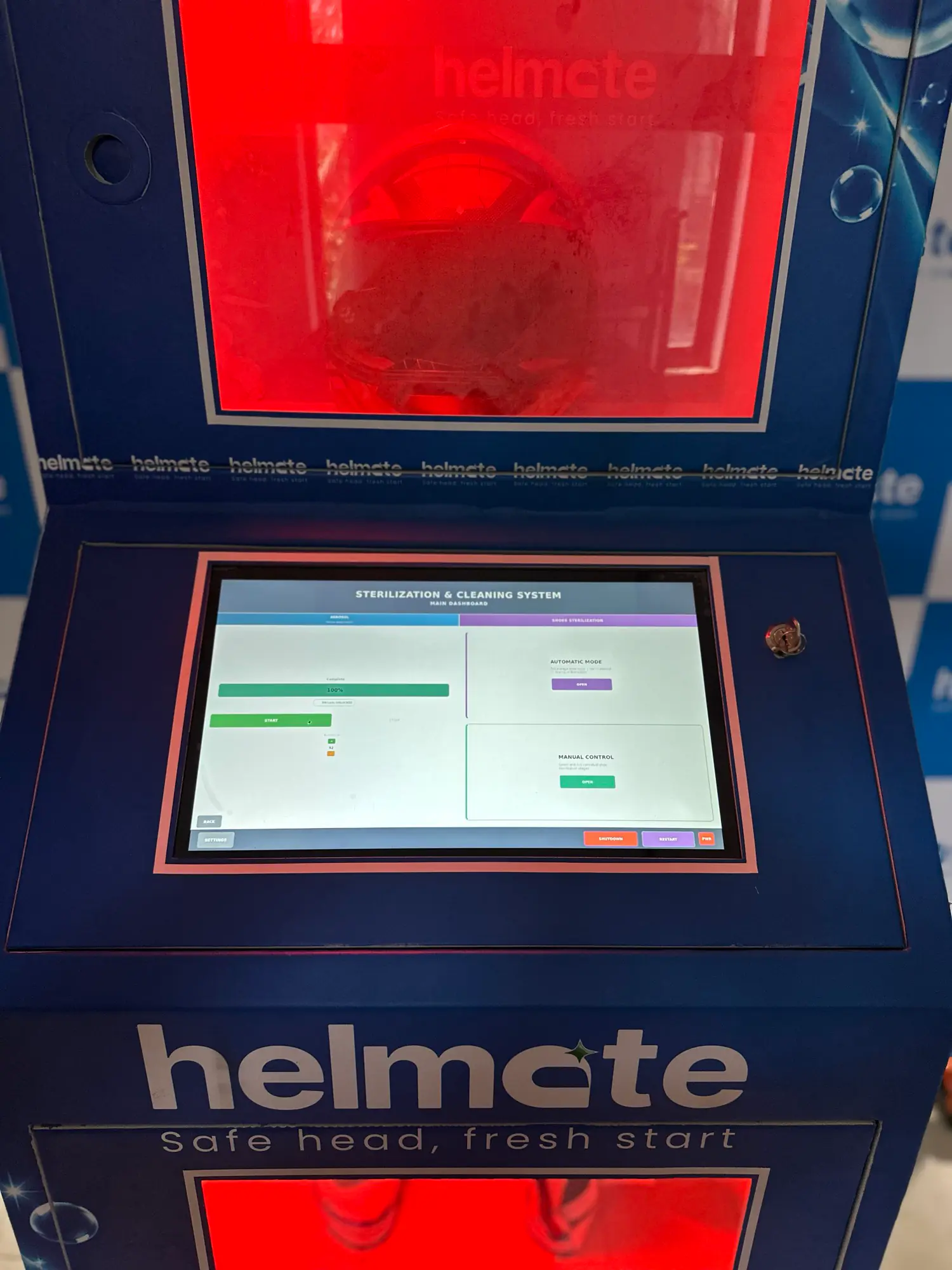 The Helmate machine's touchscreen running the sterilization and cleaning system