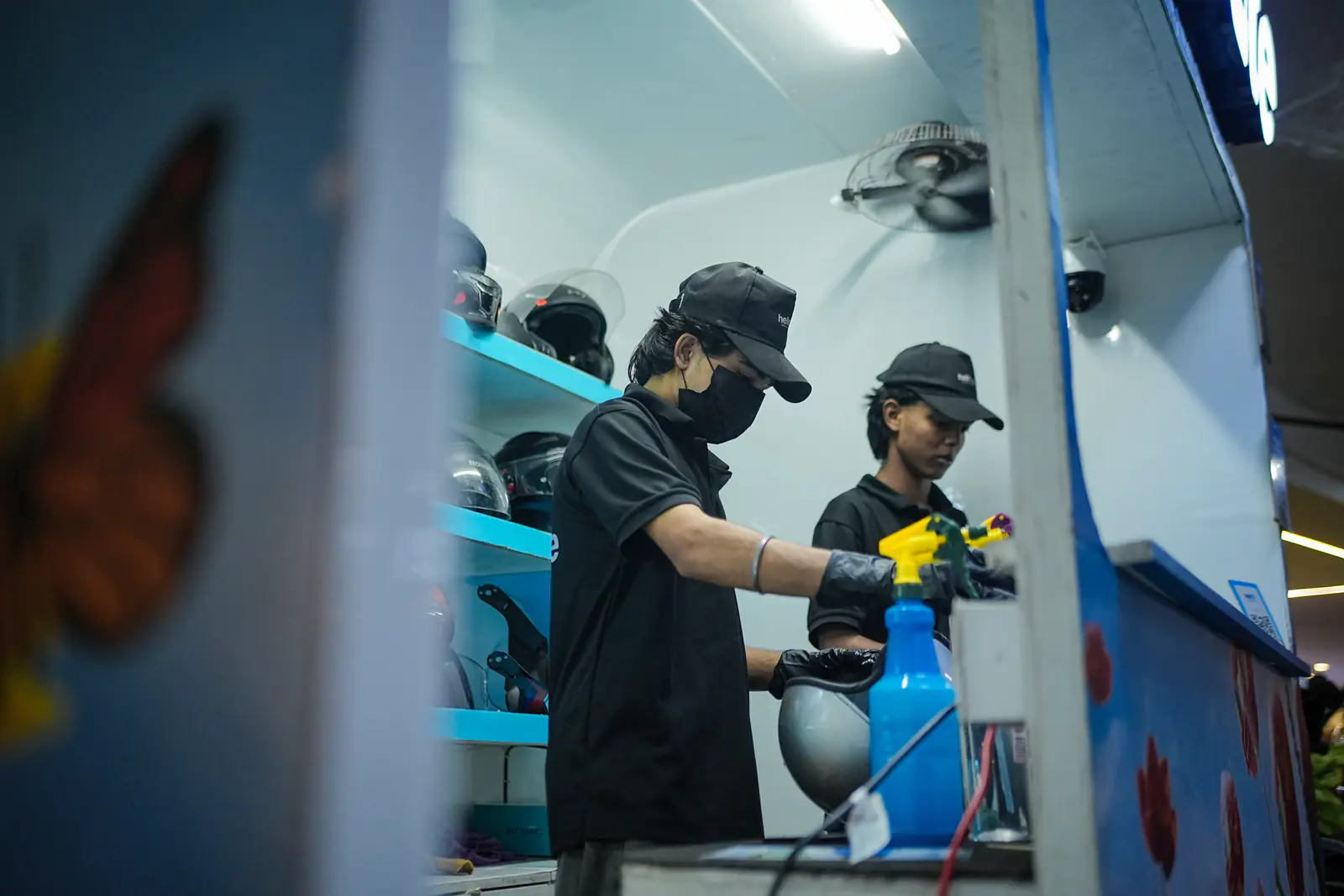 A wide view of the Helmate cleaning station and helmet shelving